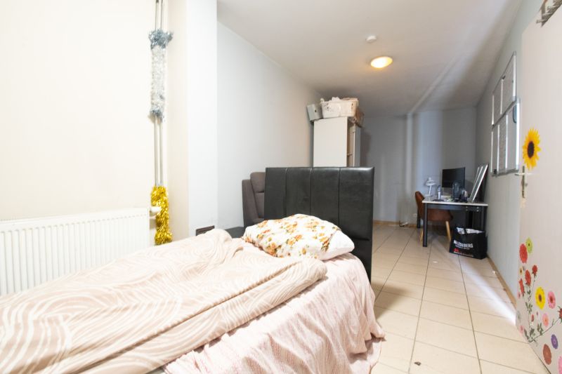 Vergund opbrengsteigendom met 6 kamers en tuin te Gent — foto 3